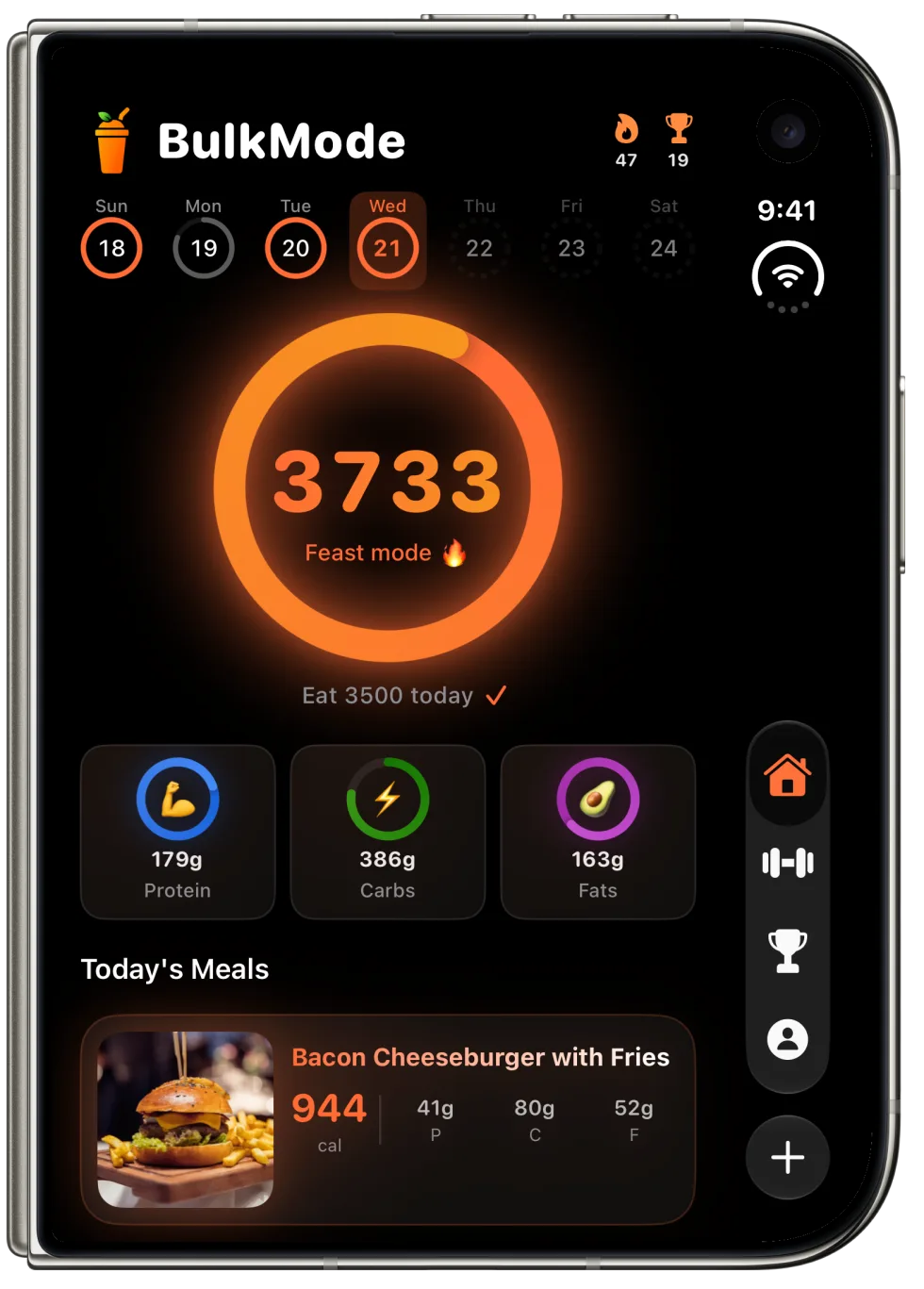 BulkMode on a folded iPhone Duo's cover screen: the calorie ring, macros and a logged burger